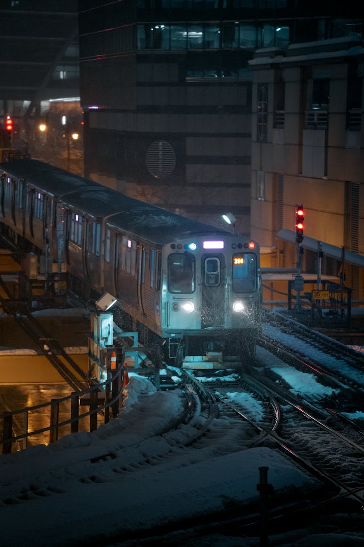 Night Photography Of A Train In Chicago