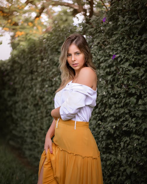 Pretty Woman Wearing Off Shoulder Blouse Posing 