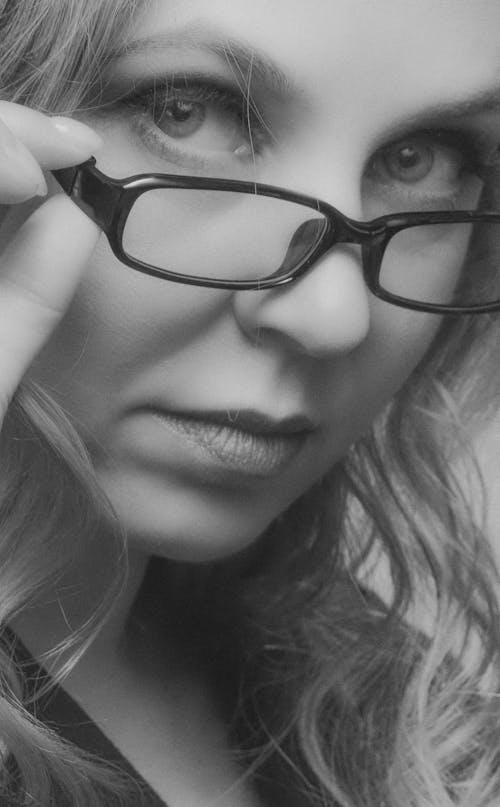 Woman Wearing Black Framed Eyeglasses 