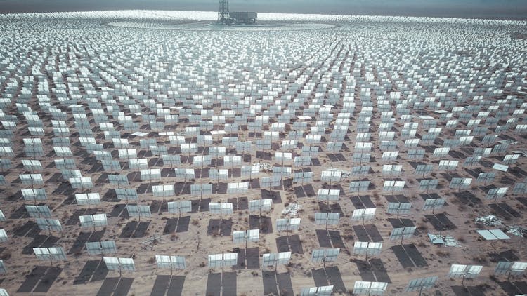 Photograph Of Solar Panels On A Field