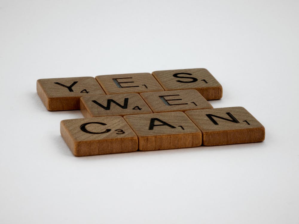 Free Scrabble Letter Tiles Forming a Message Stock Photo