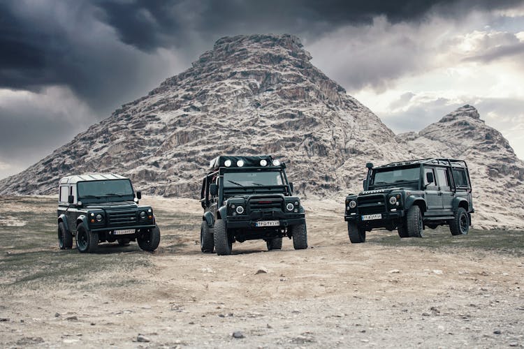 Jeeps Near Rocks