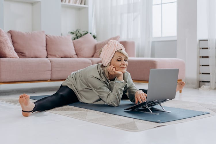 A Woman Doing Exercise At Home