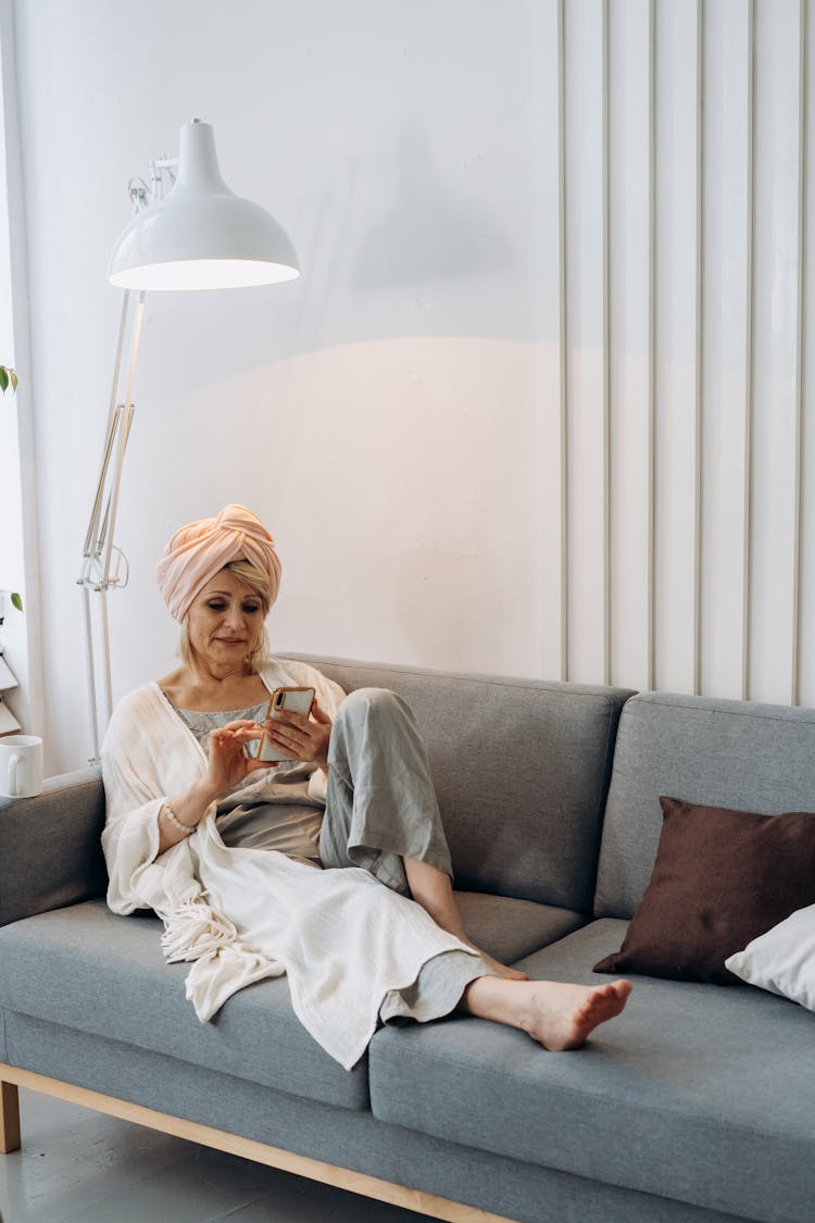 Woman Sitting On Couch