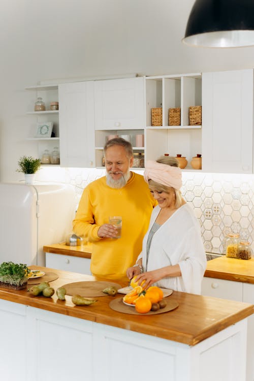 Free An Elderly Couple in the Kitchen Stock Photo