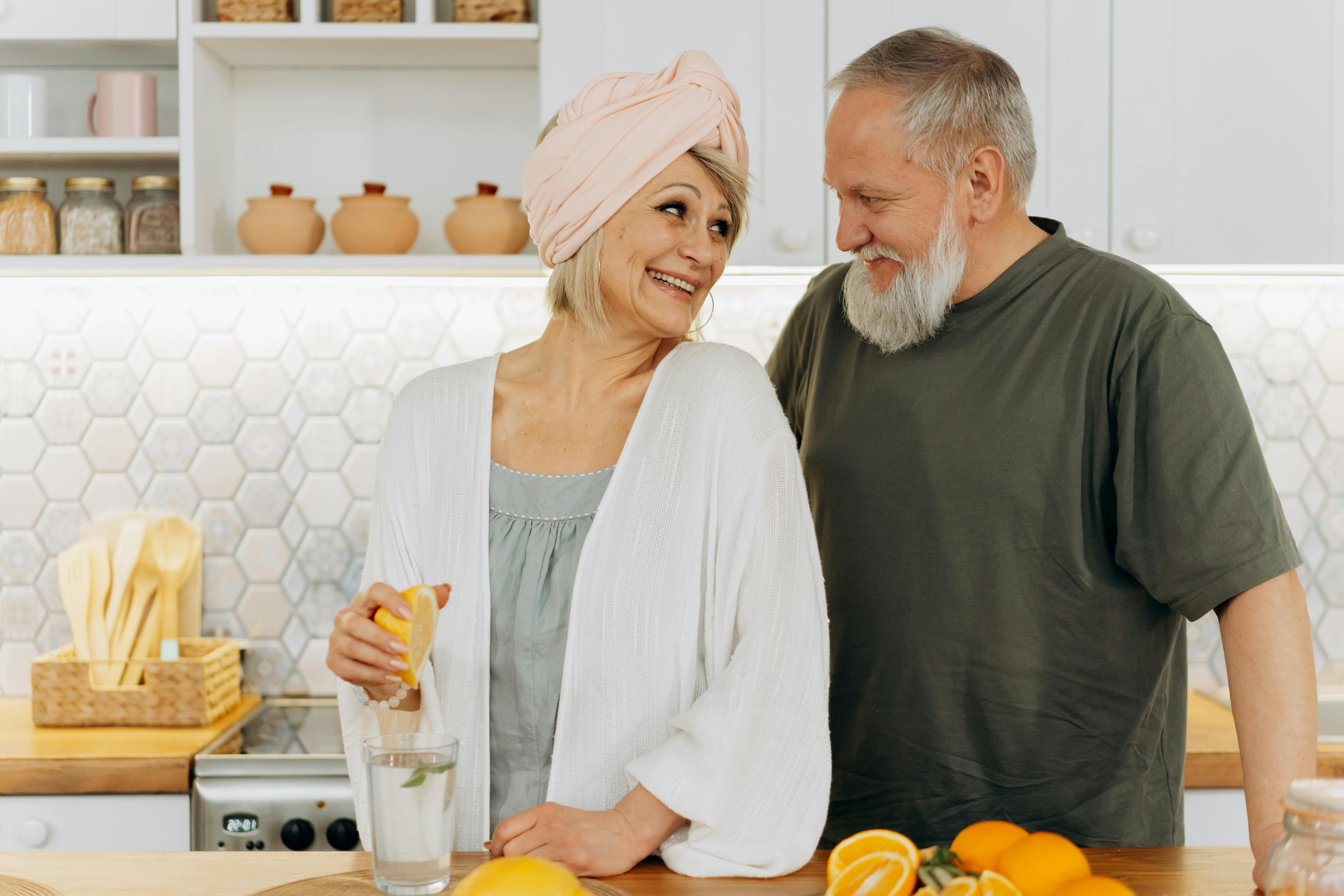 elderly couple looking at each other