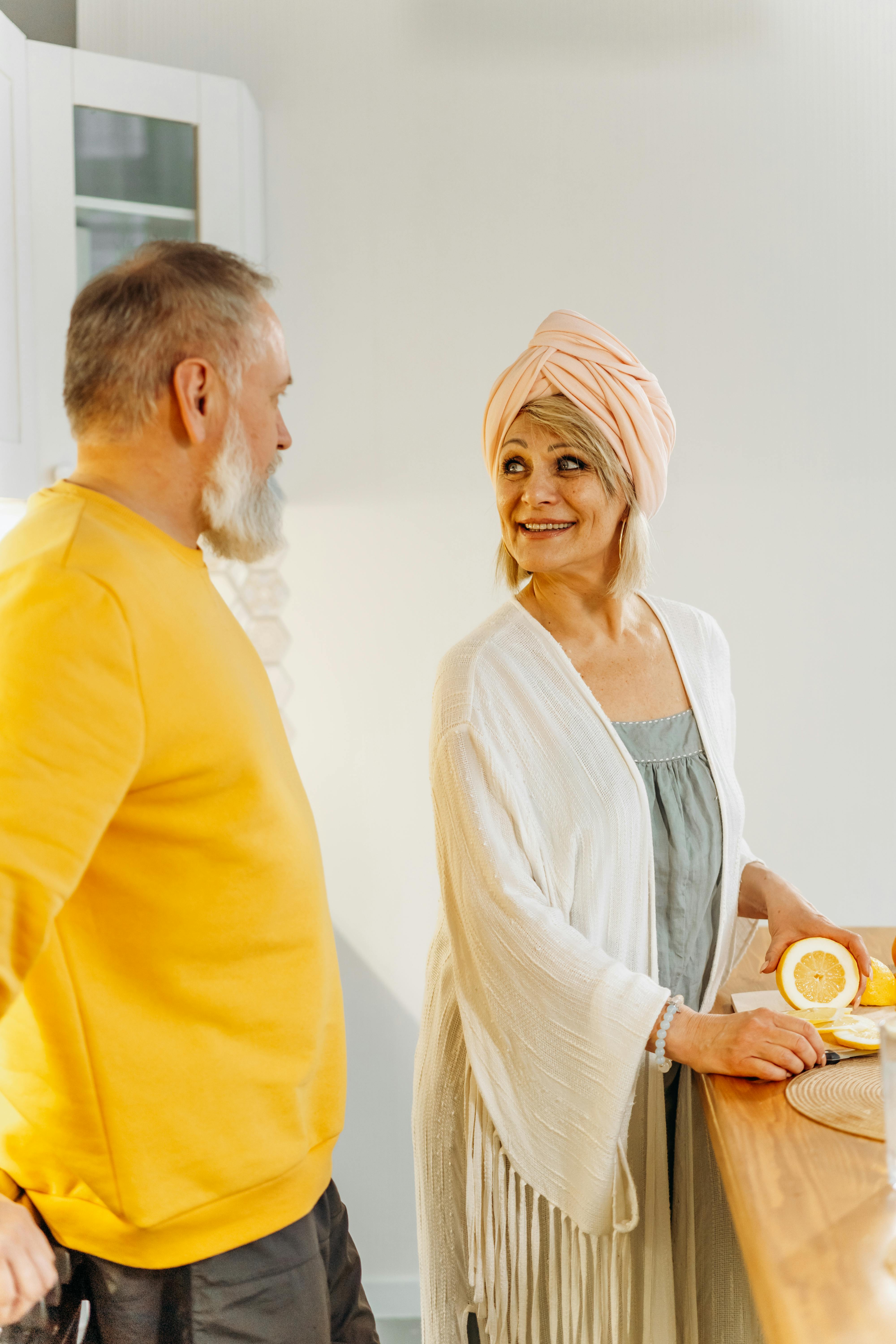 elderly couple looking at each other