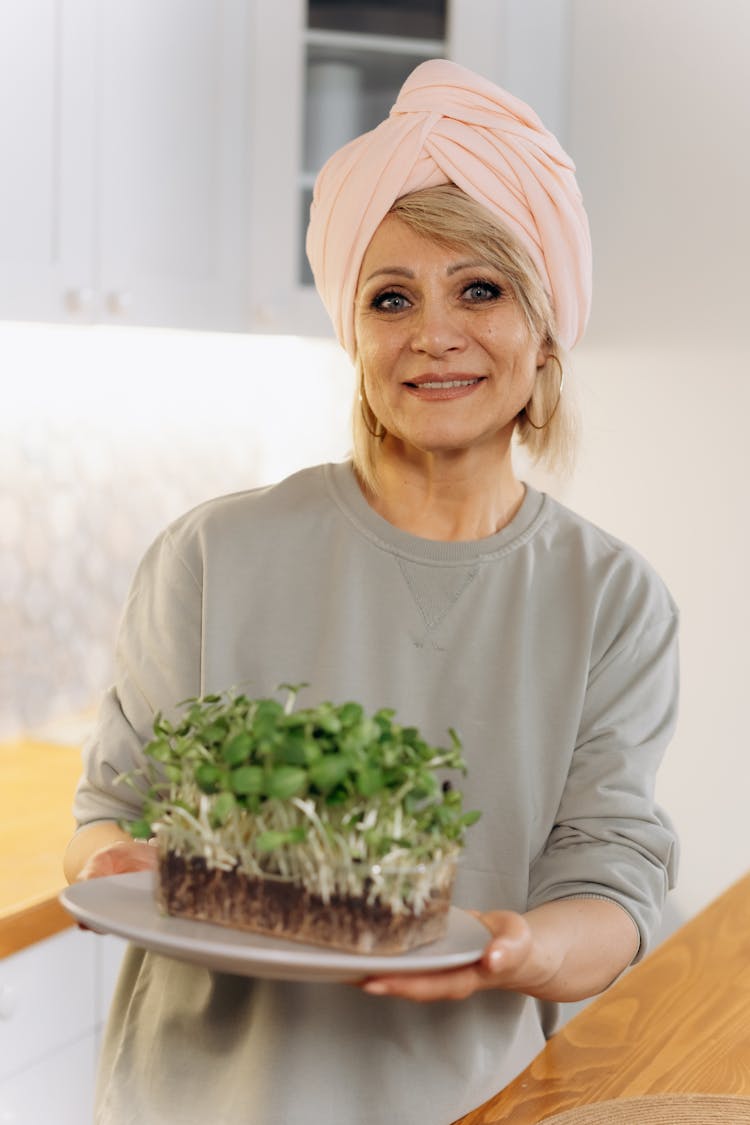 A Woman Holding Plants