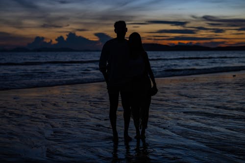 Silhouette of a Couple at the Beach