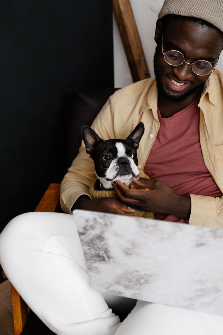 Black Man With Dog And Laptop