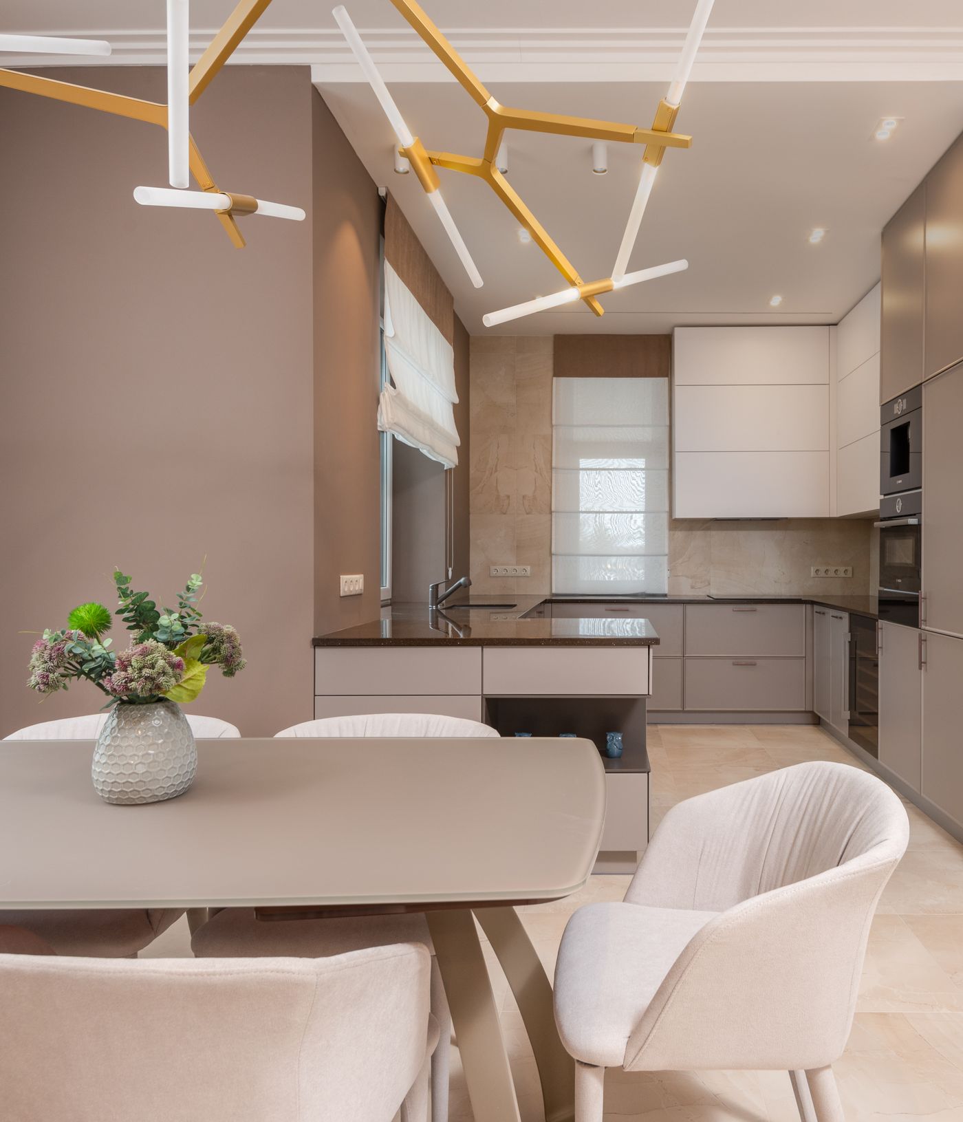 Stylish open plan kitchen with neutral finishes
