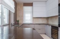Kitchen interior with light furniture