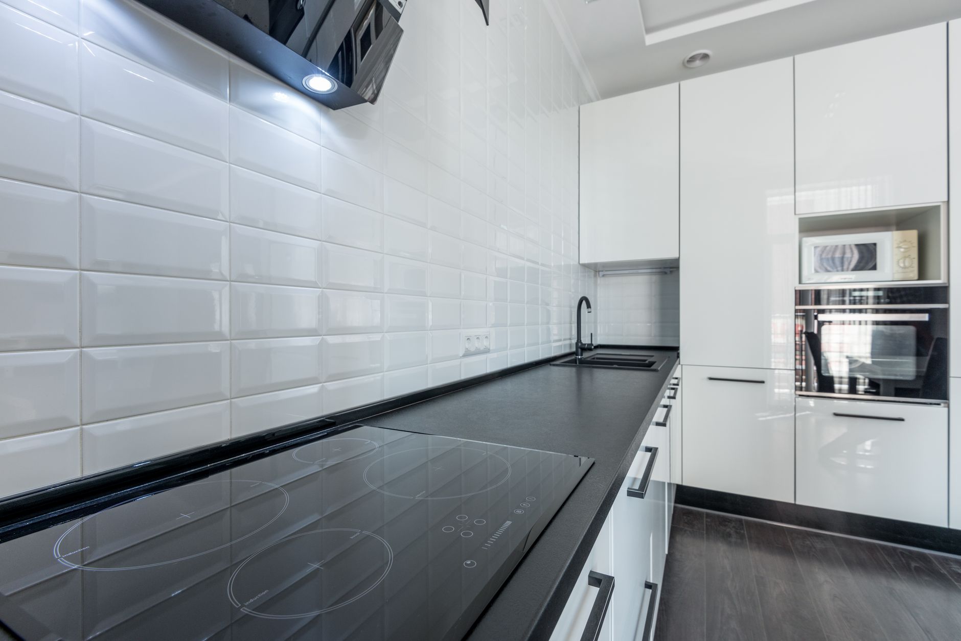 Modern kitchen interior with white microwave