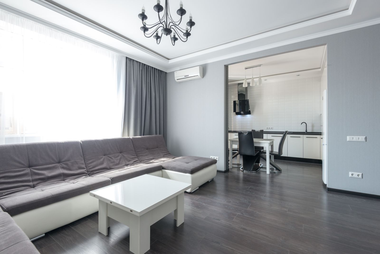 Modern open plan home interior illustrating residential air conditioning design context