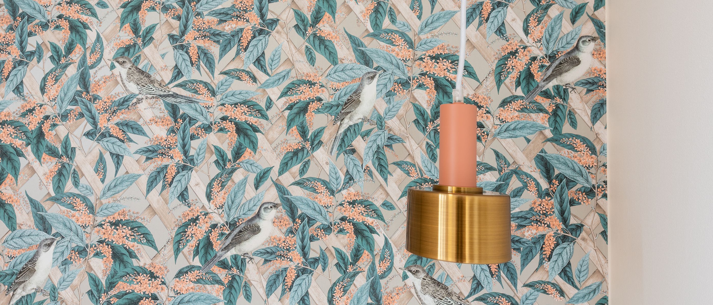 Wallpapering in Kentish Town — clean edges cut in around trim and sockets