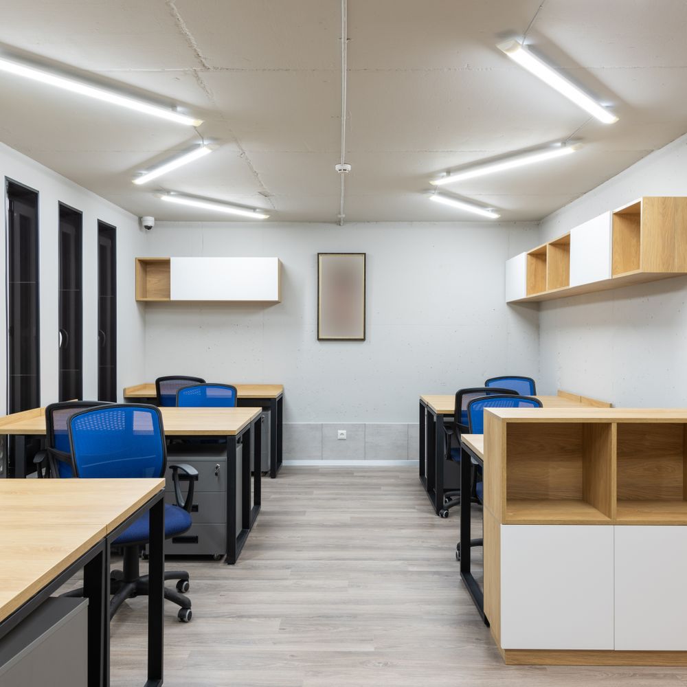 Iwerne Minster — office relocation team moving desks and equipment
