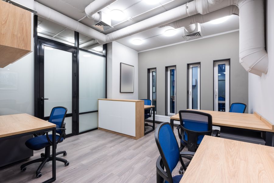 Clean open office workspace with desks