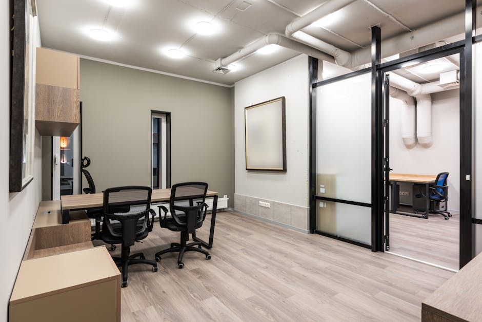 Contemporary workplace with wooden tables and chairs