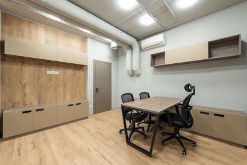 Contemporary office with wooden furniture