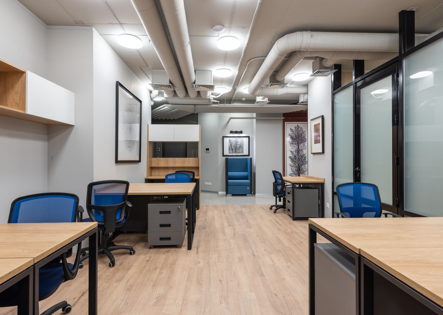 Office removals in Sedbergh — crew wrapping and loading on moving day