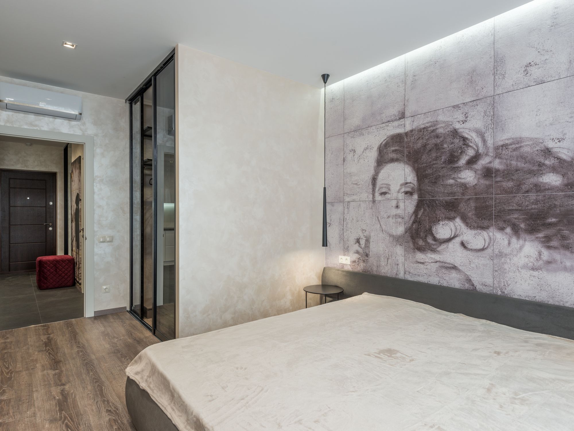 Wallpapering in Finsbury Park, Islington — decorator hanging pattern-matched wallpaper