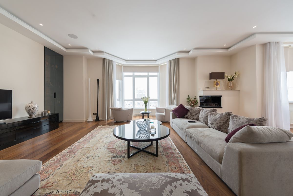 Daylit elegant sitting room with sofa and coffee table at The Lookout