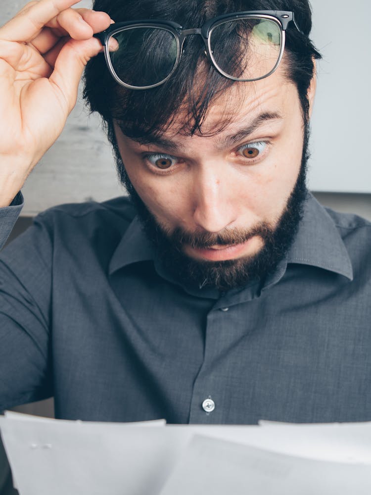 Bearded Man With Eyeglasses Feeling Shocked