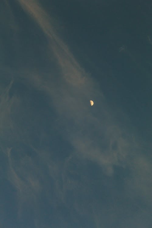 Full frame of dark blue sky with crescent moon