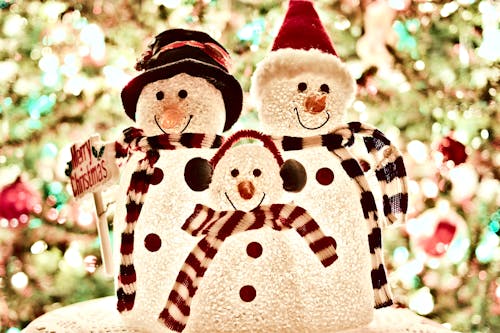 Free Three White Snowman Decorations Stock Photo