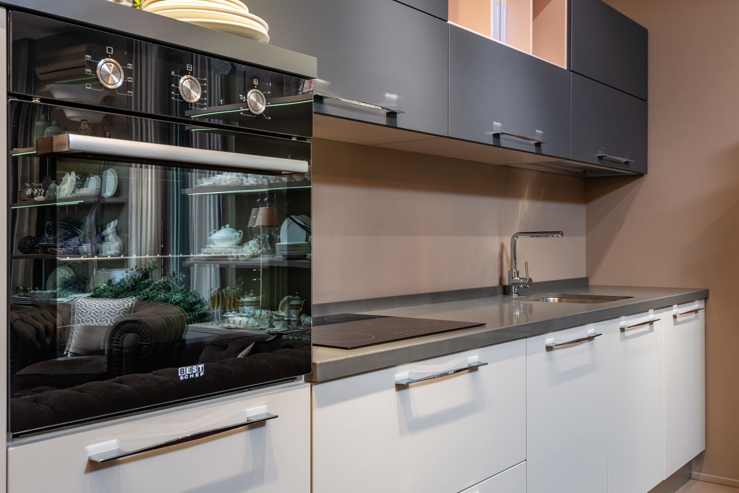 Modern built-in oven in kitchen for oven repair service Dubai