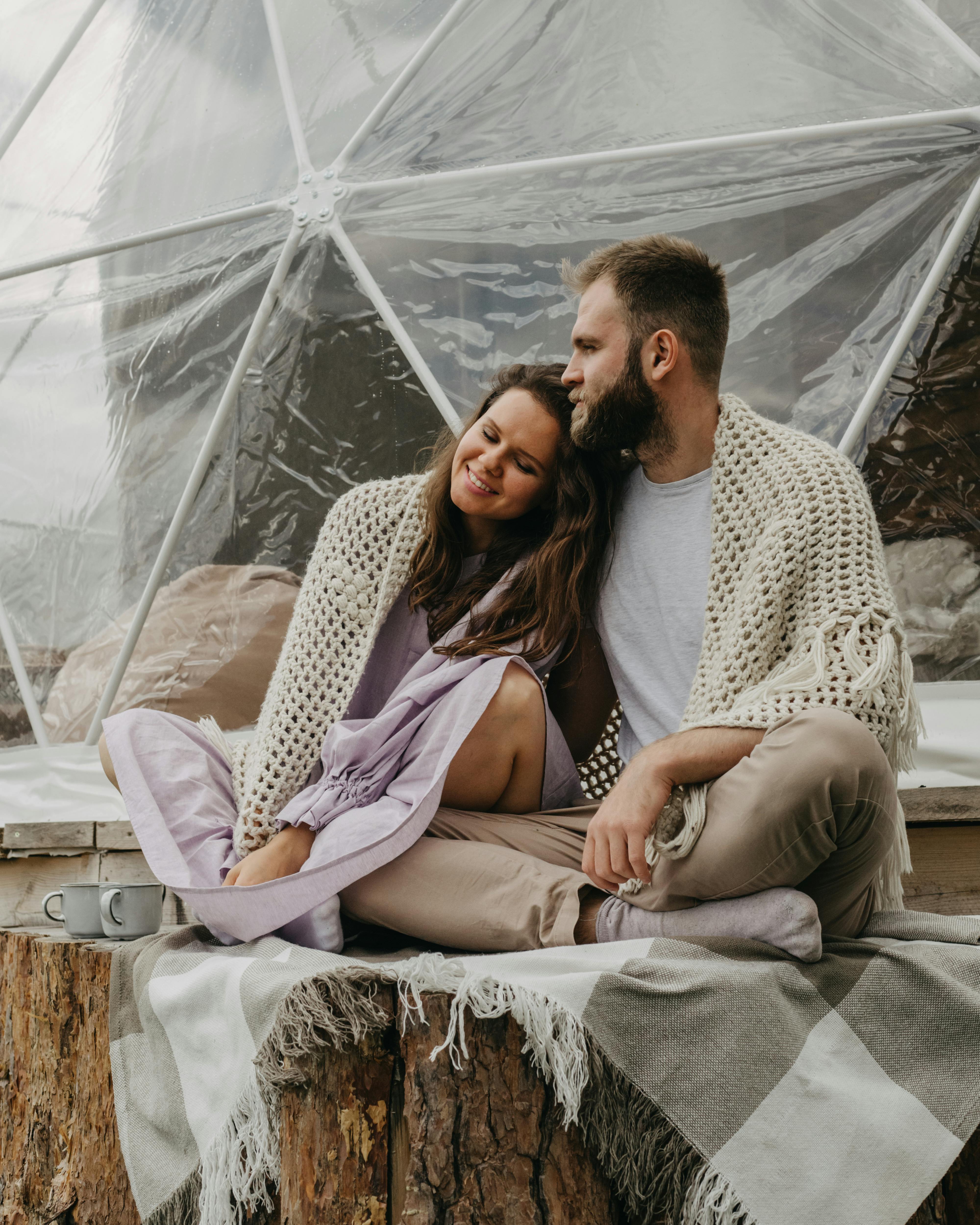 happy couple chilling in modern nature resort