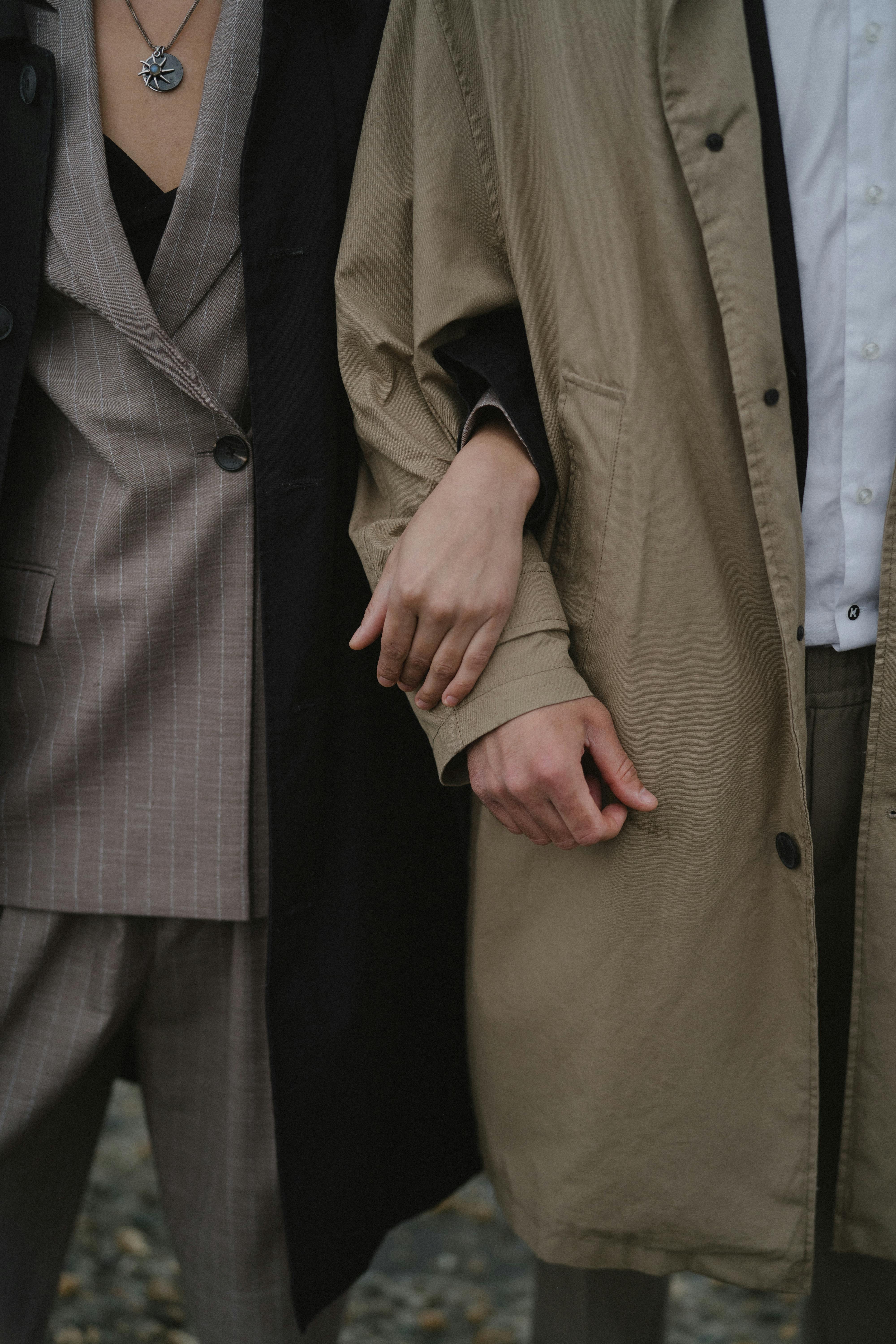 man in brown suit jacket