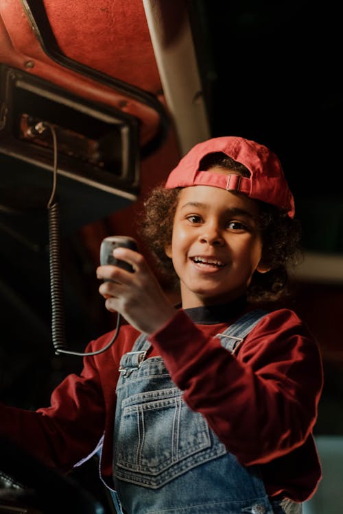 Boy Holding a Radio