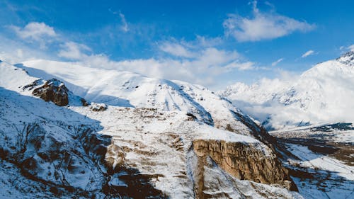 Free Snow Covered Mountains during Daytime  Stock Photo