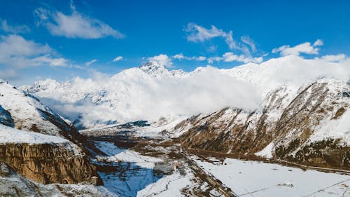 Free Snow Covered Mountains during Daytime  Stock Photo