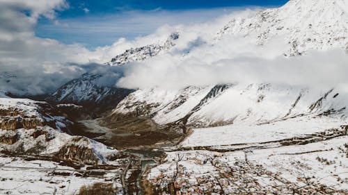 Free Snow Covered Mountains during Daytime  Stock Photo