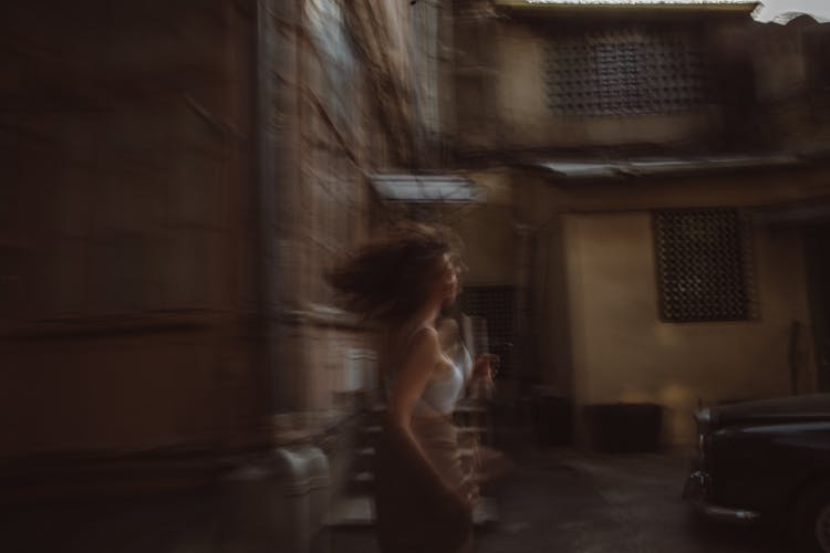 Blurred Picture Of Woman Running