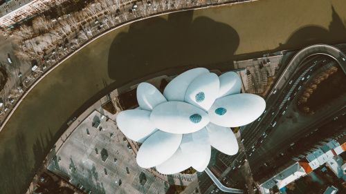 Free Drone shot capturing the architectural design of Tbilisi's Ministry of Justice from above. Stock Photo