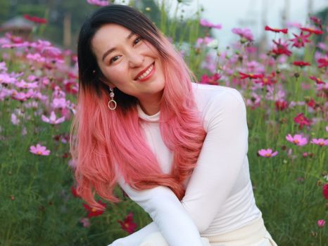 A Beautiful Woman in White Sweater Smiling