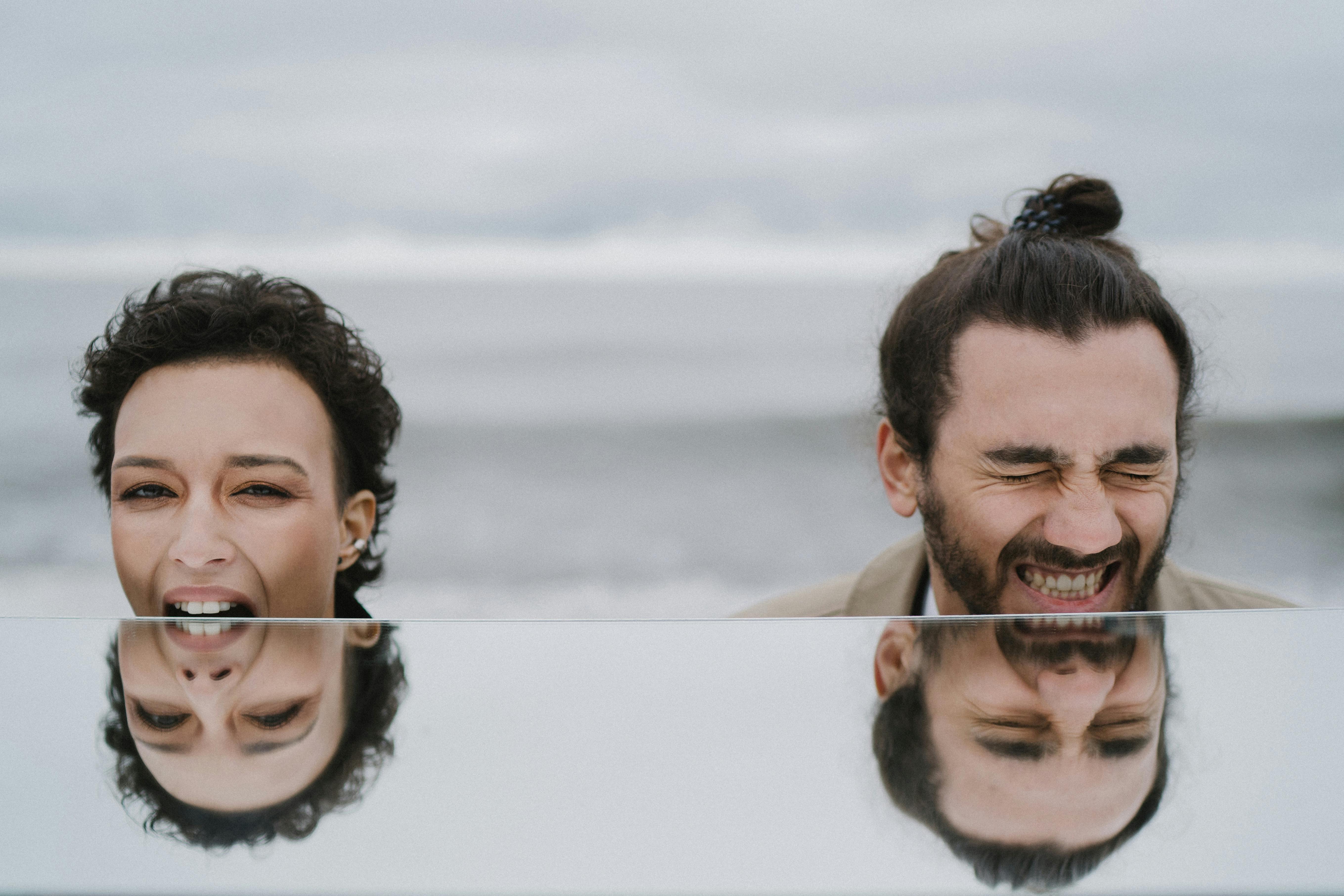 man and woman smiling