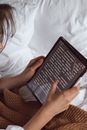 A Person Holding a Tablet
