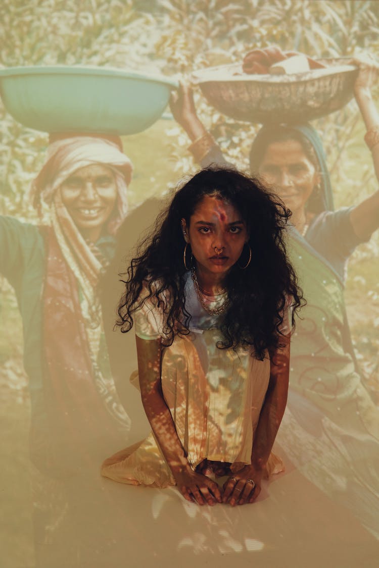 Projection Photography Of Woman Sitting On A Floor