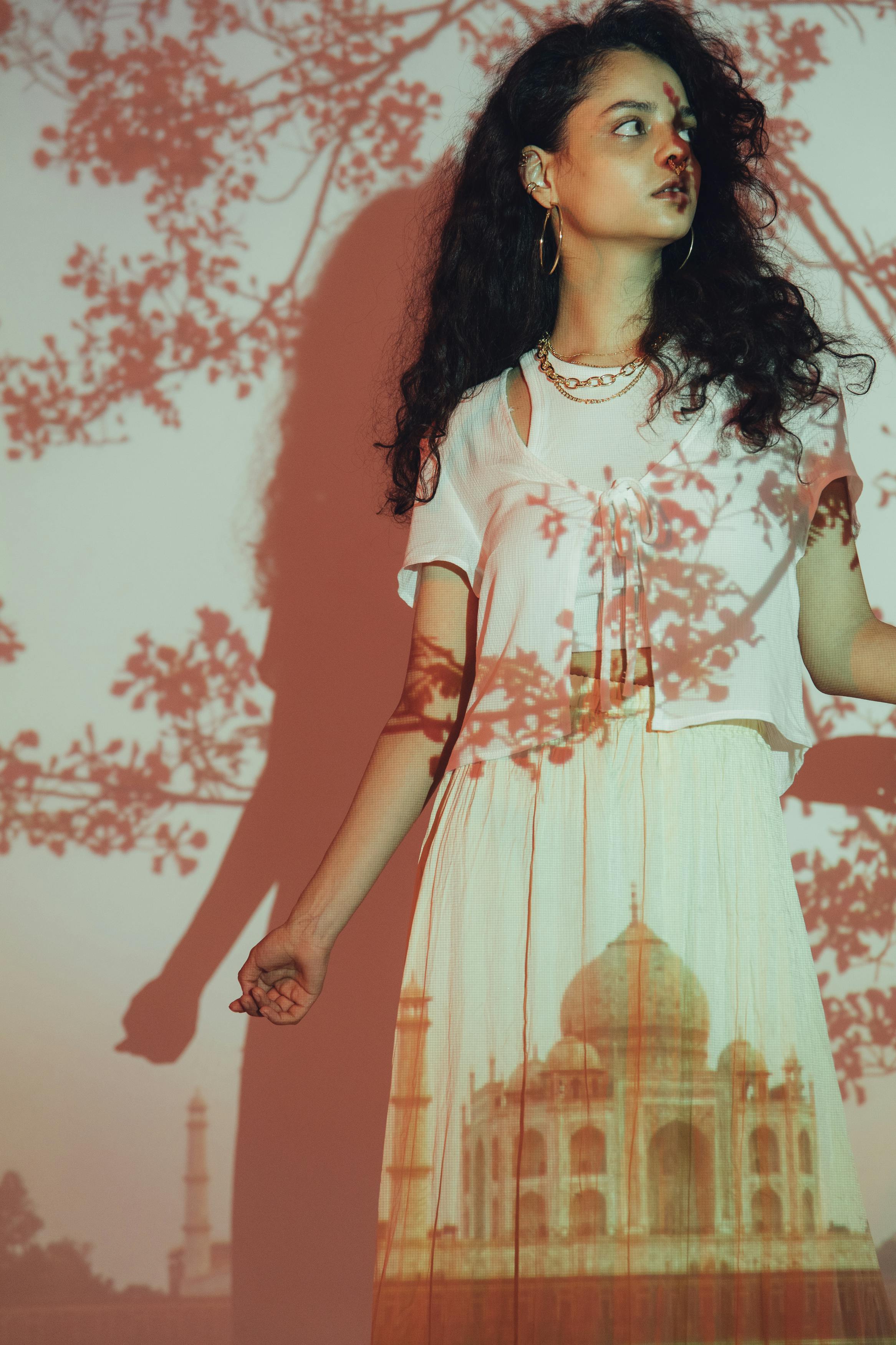 Woman in White and Red Floral Dress