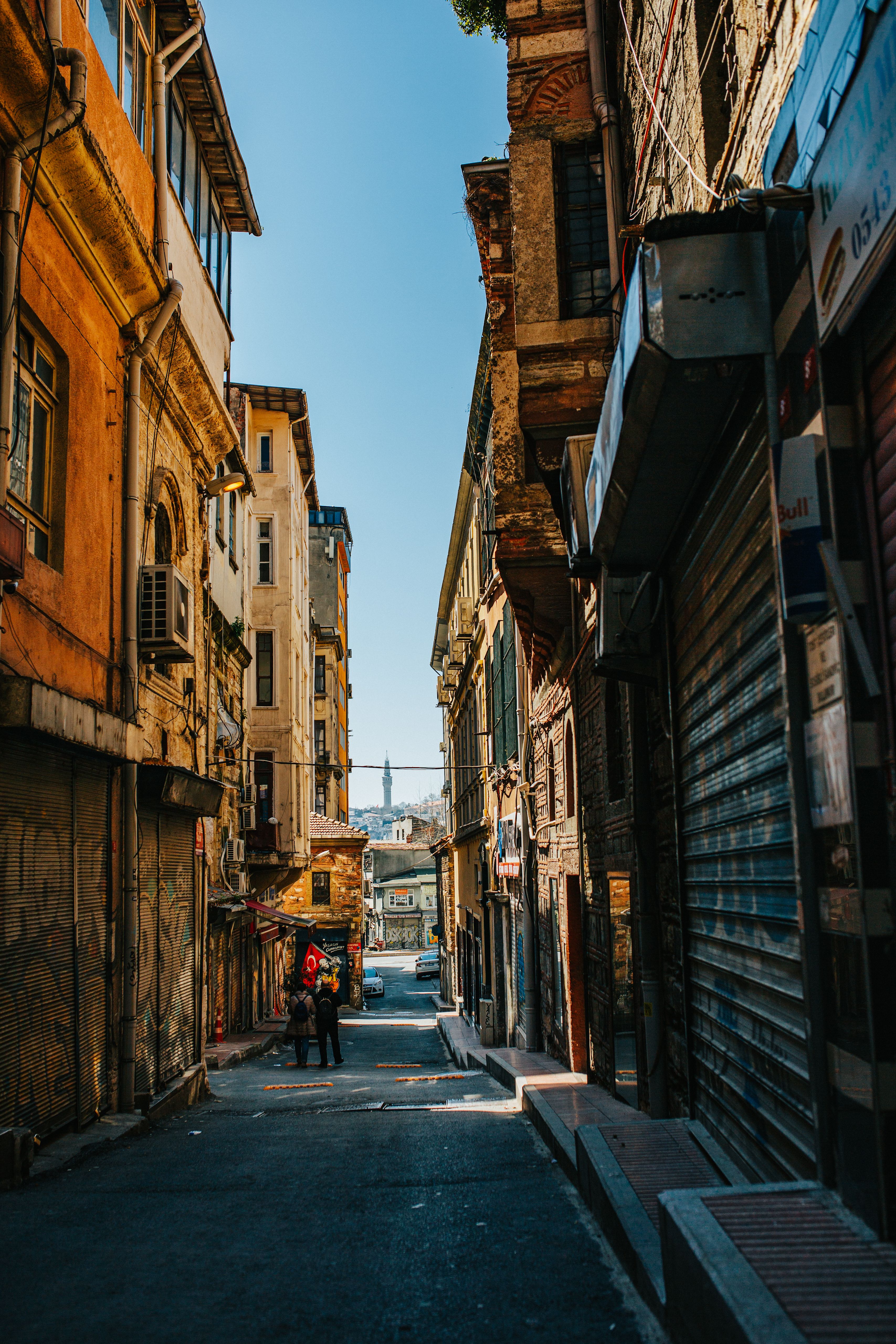 Narrow street with aged buildings · Free Stock Photo