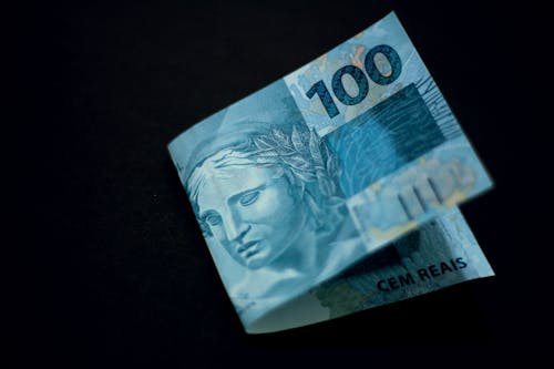 Paper Money on Black Surface