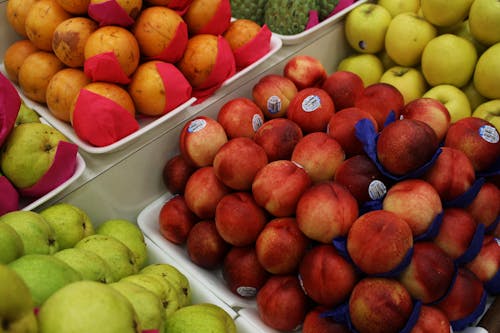 Piles of Assorted Round Fruits