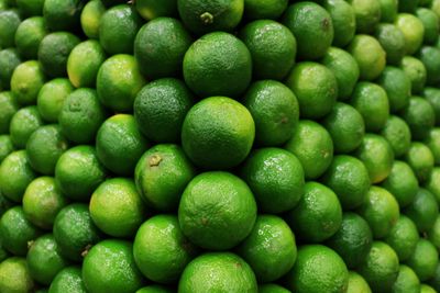Stack of fresh green limes — photo by Daniel Dan on Pexels