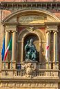 Green Statue of Man Sitting