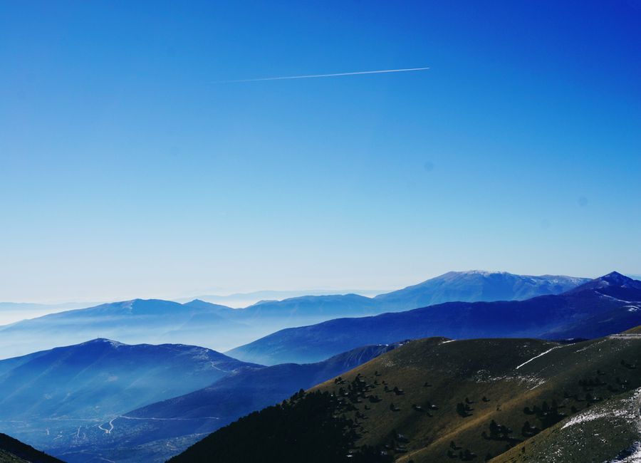Breathtaking view of a mountain range under a clear sky in Drama, Greece.