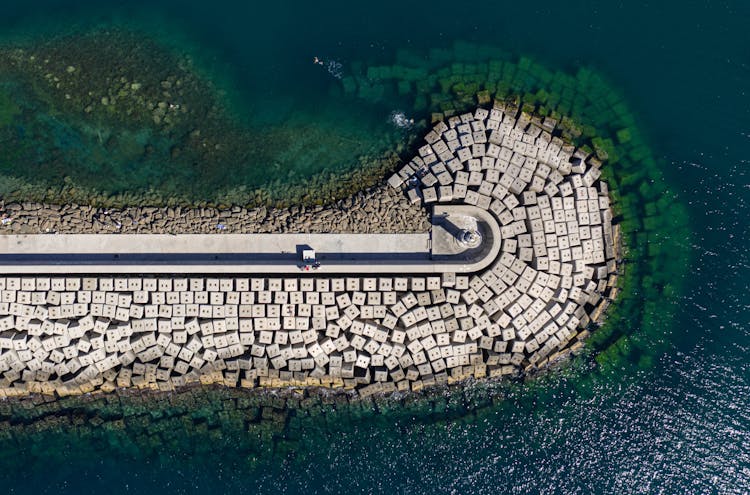 Drone Shot Of A Concrete Jetty